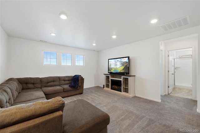 12826 Lake Port St, Longmont, CO 80504 - carpeted living area featuring recessed lighting and a fireplace