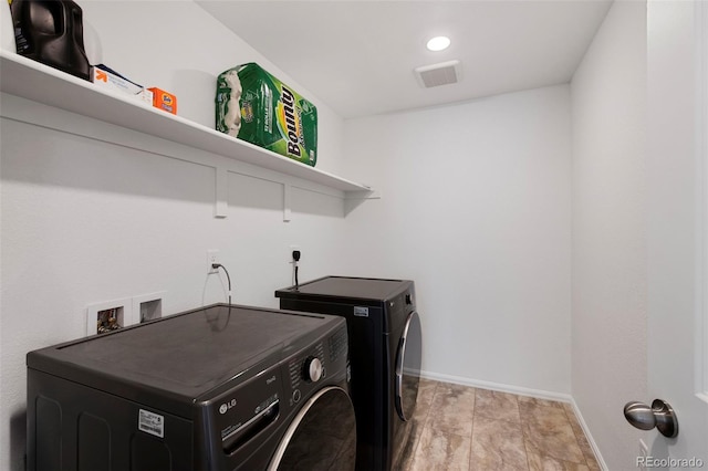 12826 Lake Port St, Longmont, CO 80504 - washroom with washing machine and dryer and recessed lighting