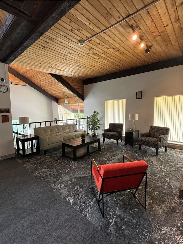 interior space with vaulted ceiling with beams and wood ceiling