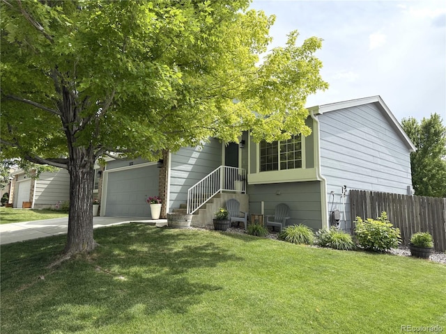 3771 S Kirk Way, Aurora, CO 80013 - view of front of property with driveway and an attached garage