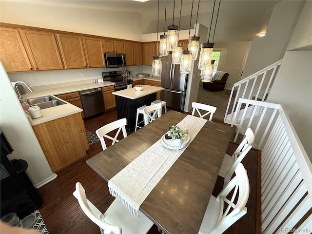 3771 S Kirk Way, Aurora, CO 80013 - dining area with stairway and dark wood-style flooring