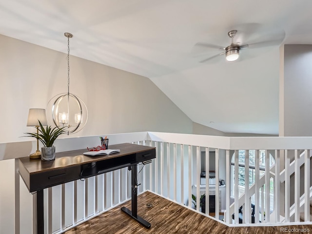 6827 S Webster St Unit E, Littleton, CO 80128 - hall with wood finished floors, lofted ceiling, and a chandelier
