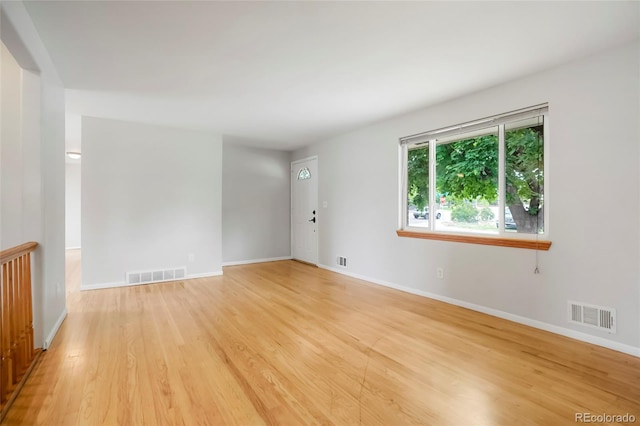 6698 S Wellington Ct, Centennial, CO 80121 - empty room with light wood-style floors and baseboards