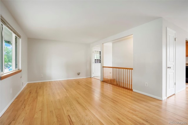 6698 S Wellington Ct, Centennial, CO 80121 - unfurnished room with light wood-style floors and baseboards