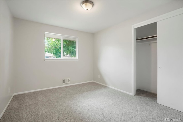 6698 S Wellington Ct, Centennial, CO 80121 - unfurnished bedroom with carpet flooring, baseboards, and a closet