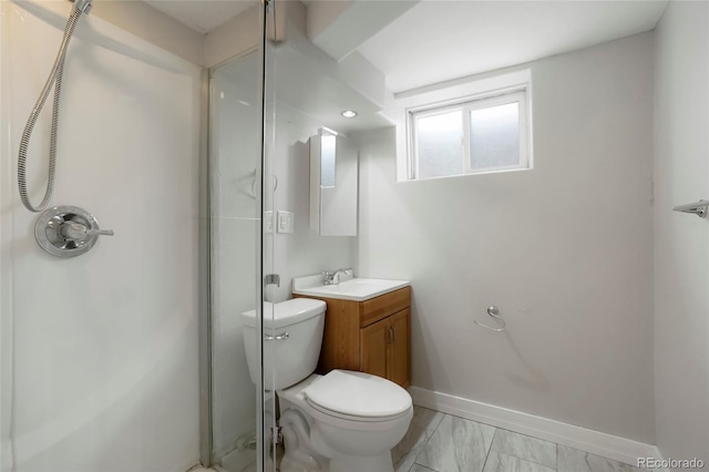 6698 S Wellington Ct, Centennial, CO 80121 - bathroom featuring vanity, a shower stall, toilet, baseboards, and marble finish floors