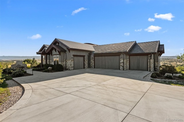 view of front of home with a garage