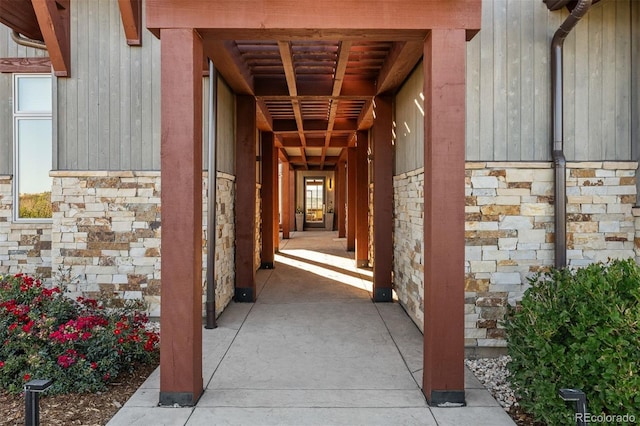 entrance to property featuring a patio area