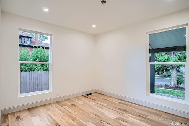 3975 Yates St, Denver, CO 80212 - spare room with light wood finished floors, recessed lighting, and a pendent fire sprinkler