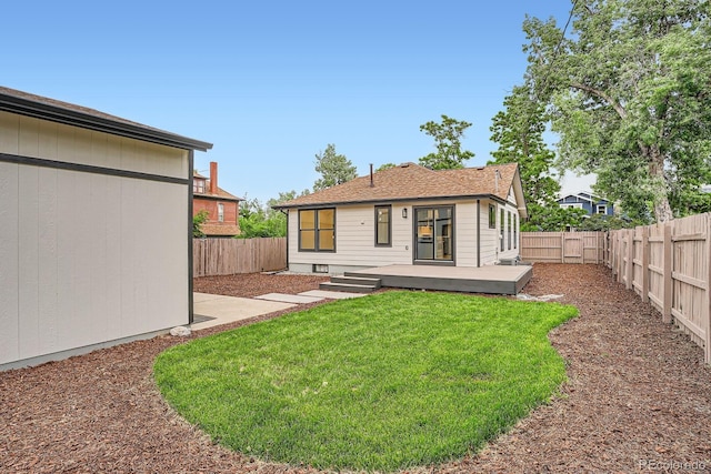 3975 Yates St, Denver, CO 80212 - back of house featuring a fenced backyard and a deck