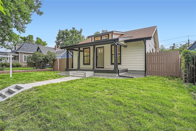 3975 Yates St, Denver, CO 80212 - view of front facade with covered porch and a shingled roof