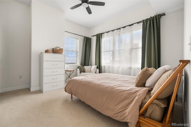 1950 N Logan St Unit 905, Denver, CO 80203 - carpeted bedroom featuring baseboards and ceiling fan