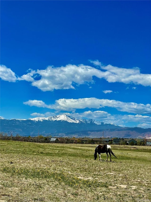 property view of mountains featuring a rural view