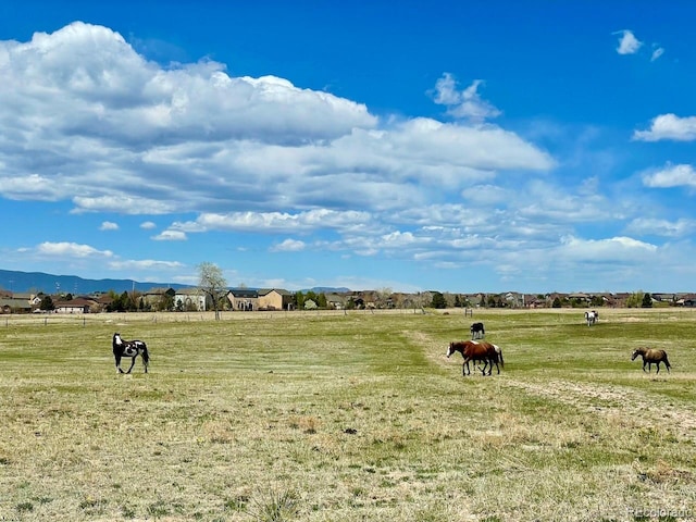 exterior space with a rural view