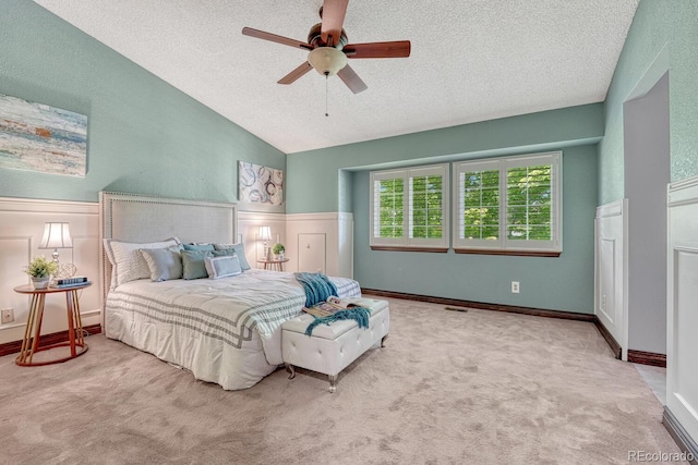 302 Northridge Rd, Highlands Ranch, CO 80126 - bedroom with a textured ceiling, carpet floors, lofted ceiling, and a ceiling fan