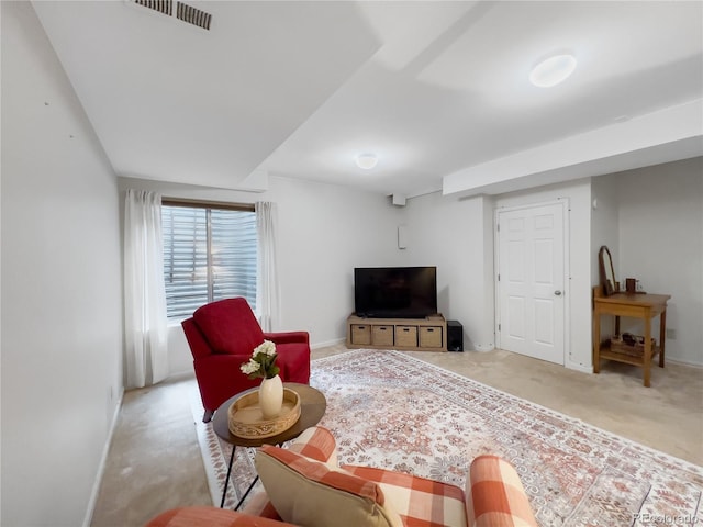 living room featuring light carpet