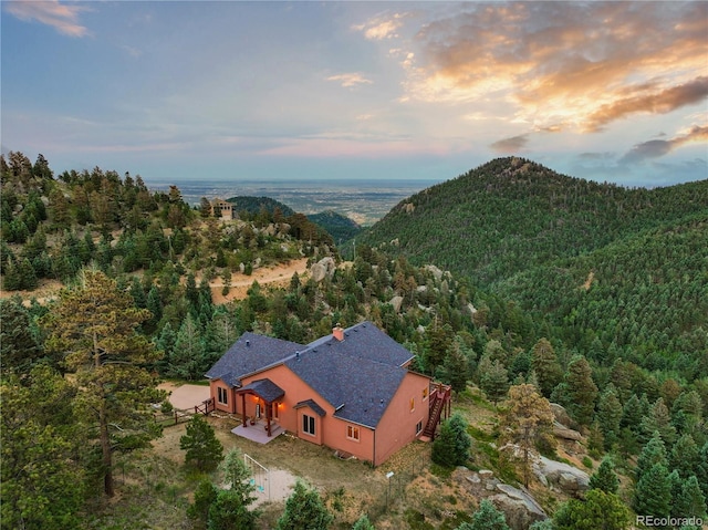 aerial view at dusk with a mountain view