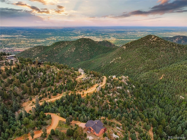 aerial view at dusk with a mountain view