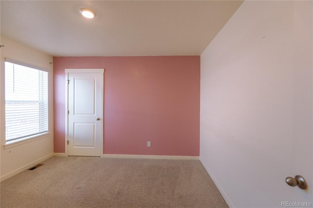 empty room featuring carpet