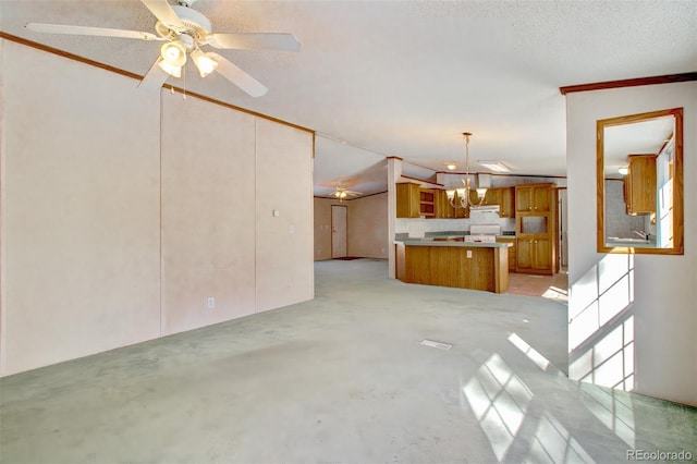 unfurnished living room featuring ceiling fan with notable chandelier, vaulted ceiling, ornamental molding, and a textured ceiling