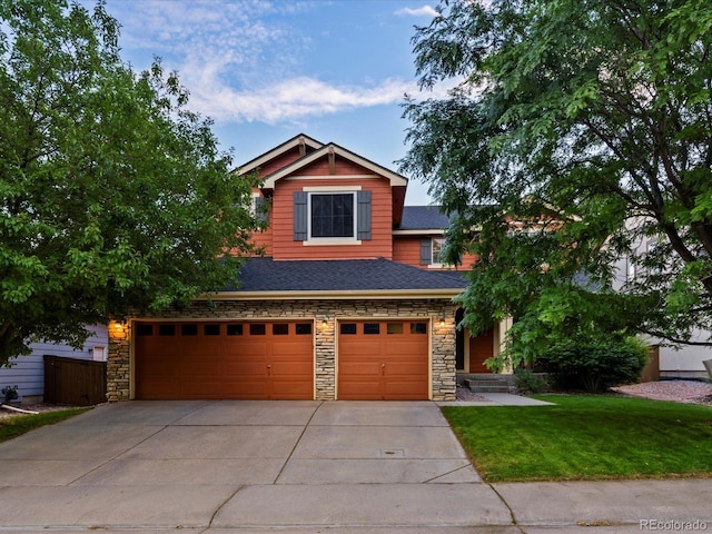 10216 Kleinbrook Way, Highlands Ranch, CO 80126 - craftsman inspired home featuring an attached garage, concrete driveway, a front lawn, stone siding, and a shingled roof