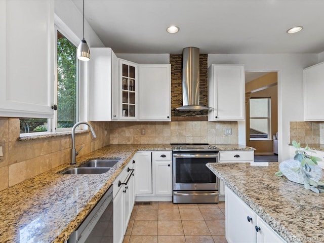10216 Kleinbrook Way, Highlands Ranch, CO 80126 - kitchen with appliances with stainless steel finishes, wall chimney range hood, white cabinets, light stone countertops, and recessed lighting
