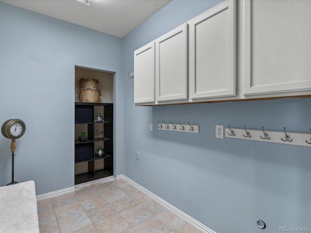 10216 Kleinbrook Way, Highlands Ranch, CO 80126 - washroom featuring baseboards and light tile patterned floors