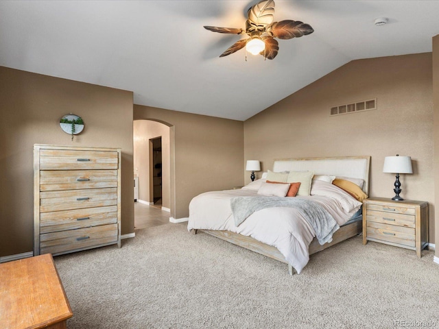 10216 Kleinbrook Way, Highlands Ranch, CO 80126 - bedroom featuring arched walkways, carpet flooring, lofted ceiling, and a ceiling fan