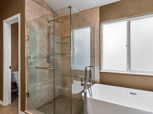 10216 Kleinbrook Way, Highlands Ranch, CO 80126 - bathroom with a freestanding bath and a shower stall