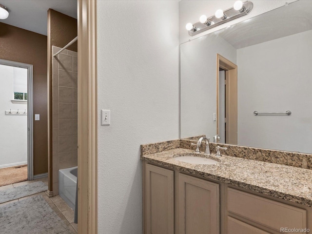 10216 Kleinbrook Way, Highlands Ranch, CO 80126 - bathroom featuring vanity, tile patterned flooring, and shower / washtub combination