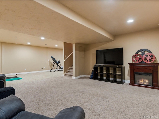 10216 Kleinbrook Way, Highlands Ranch, CO 80126 - carpeted living room with recessed lighting, stairs, and a glass covered fireplace