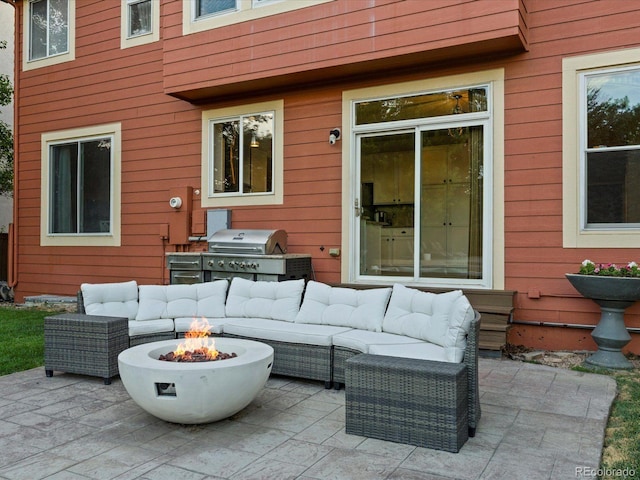 10216 Kleinbrook Way, Highlands Ranch, CO 80126 - view of patio / terrace featuring an outdoor living space with a fire pit and an outdoor kitchen