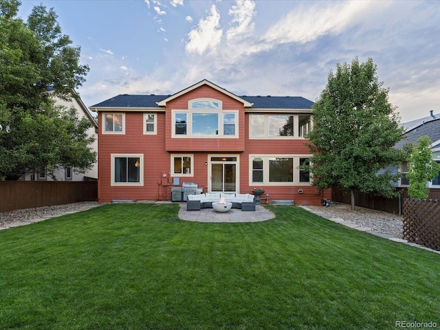 10216 Kleinbrook Way, Highlands Ranch, CO 80126 - back of house featuring outdoor lounge area, a fenced backyard, and a patio area