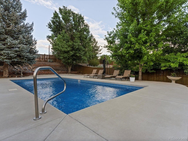 10216 Kleinbrook Way, Highlands Ranch, CO 80126 - view of swimming pool with a patio area and a fenced backyard