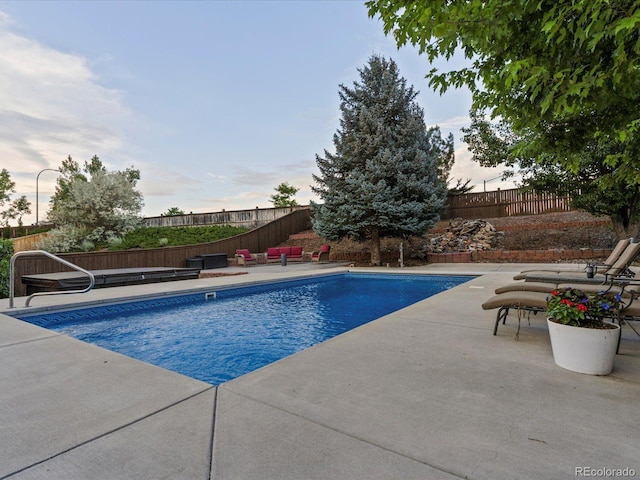 10216 Kleinbrook Way, Highlands Ranch, CO 80126 - view of swimming pool featuring a fenced backyard and a patio area