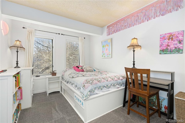 carpeted bedroom with a textured ceiling