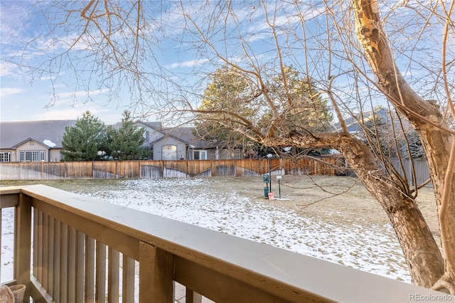 view of yard covered in snow