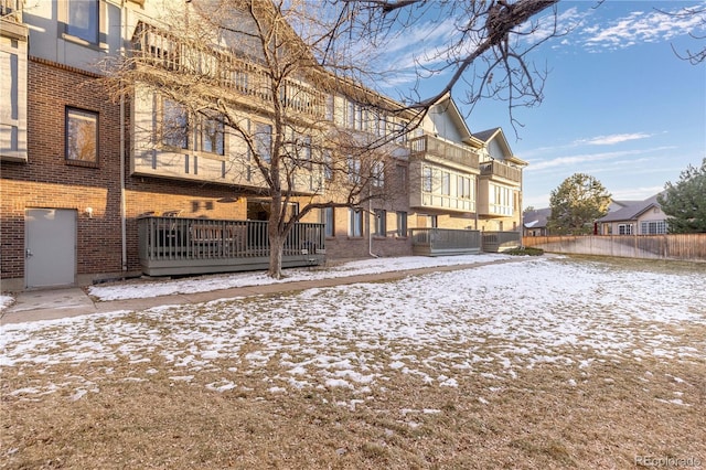 view of snow covered property