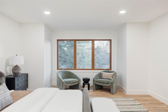 bedroom featuring recessed lighting, light wood-style flooring, and baseboards