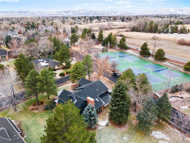 birds eye view of property with a mountain view