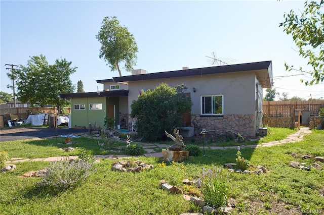 1075 S Ames St, Lakewood, CO 80226 - view of front of property with stone siding and stucco siding