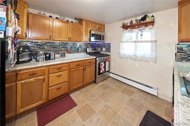 1075 S Ames St, Lakewood, CO 80226 - kitchen with appliances with stainless steel finishes, a baseboard radiator, backsplash, and brown cabinets