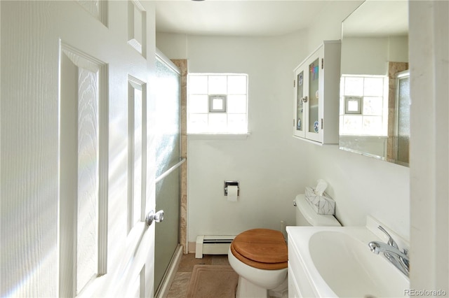 1075 S Ames St, Lakewood, CO 80226 - full bath with a baseboard radiator and a shower with shower door