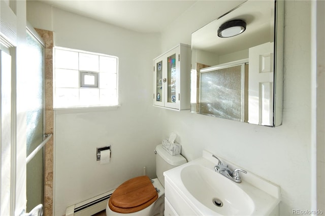 1075 S Ames St, Lakewood, CO 80226 - full bath with baseboard heating, an enclosed shower, and vanity