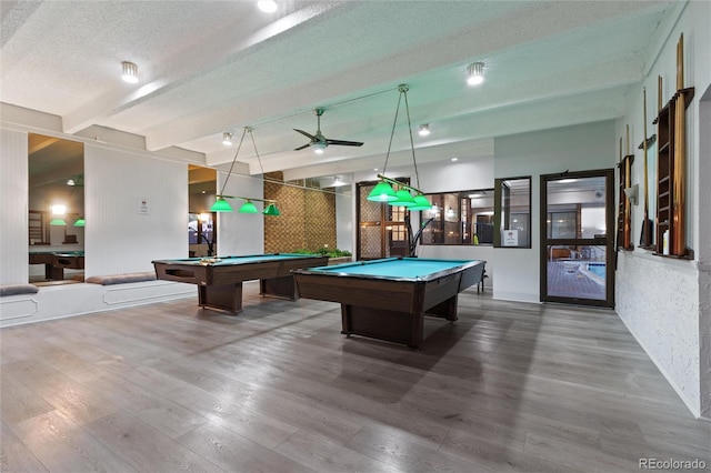 game room with hardwood / wood-style flooring, pool table, ceiling fan, and a textured ceiling