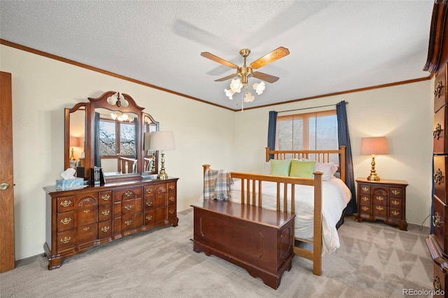 bedroom featuring light carpet, ornamental molding, and a textured ceiling