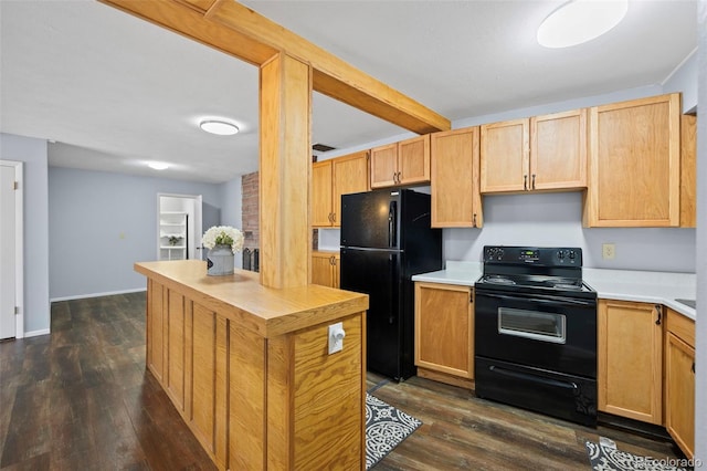 kitchen with light brown cabinets, black appliances, dark wood-style flooring, and light countertops