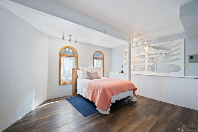 bedroom with wood finished floors