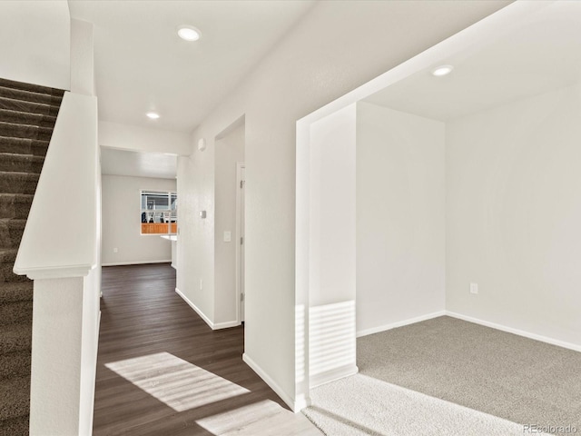 hallway featuring dark wood-type flooring