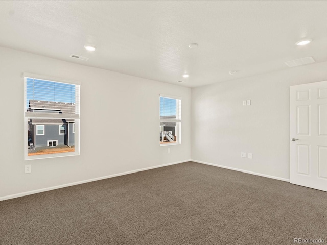 view of carpeted spare room